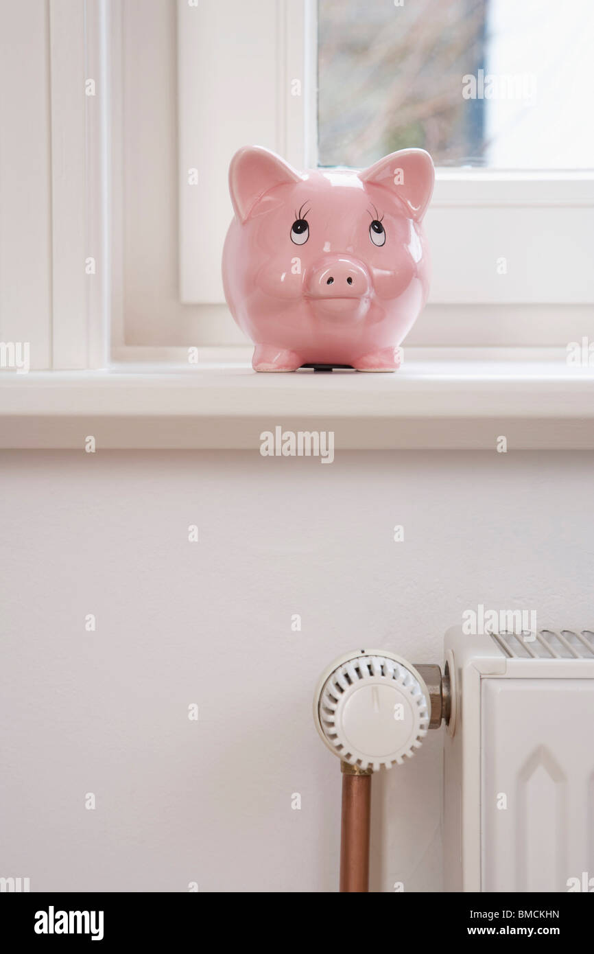 Piggy Bank and Radiator Stock Photo