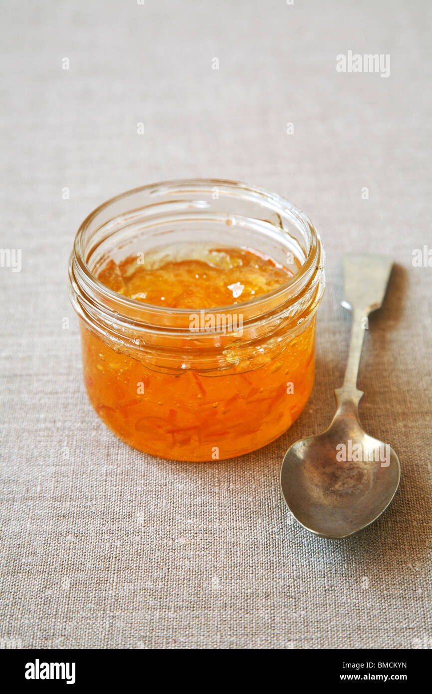 Jar of Marmalade and Vintage Spoon Stock Photo