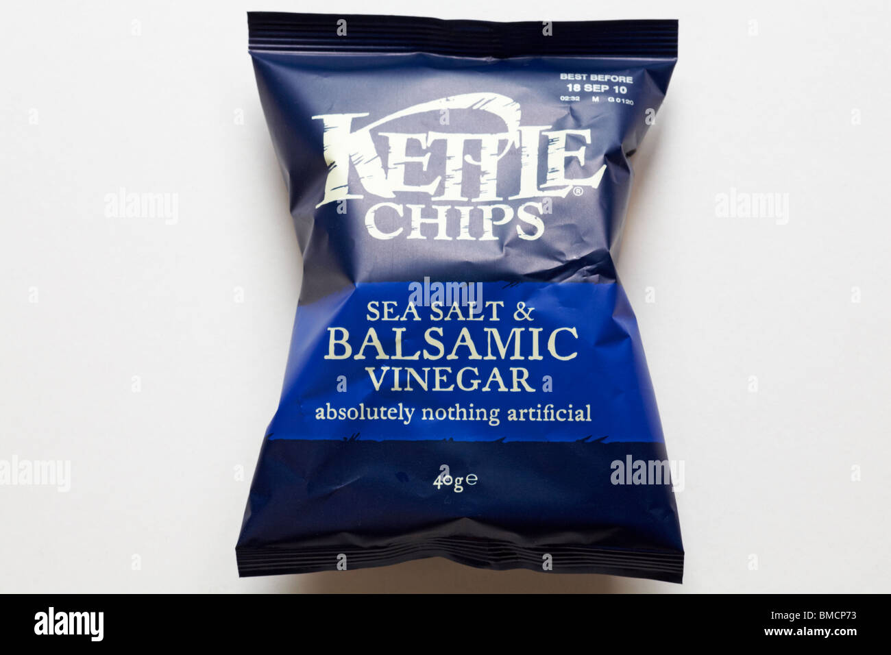 packet of sea salt & balsamic vinegar flavour Kettle Chips crisps isolated on white background Stock Photo