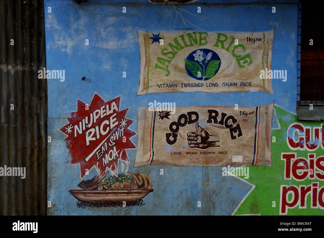 Painted posters on wall of shop in Mt Hagen, in the Highlands of Papua New Guinea Stock Photo