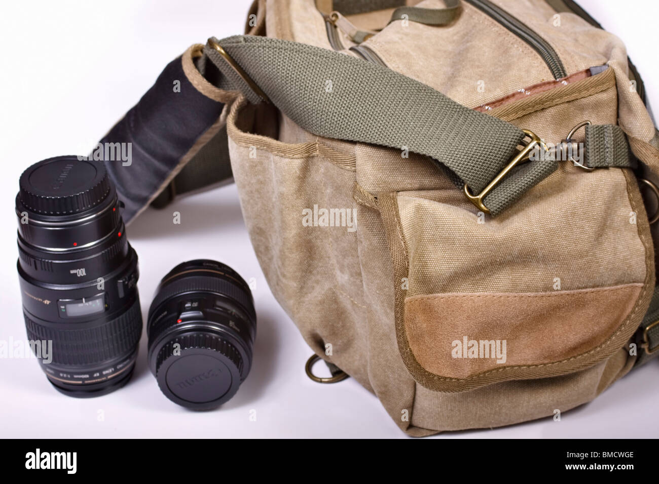 Canvas camera bag and two lenses. Stock Photo