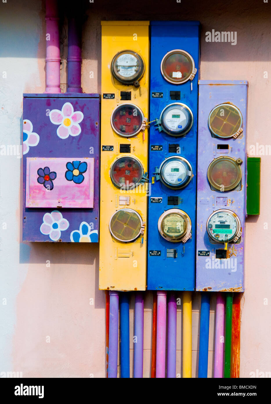 Colorful array of electricity utility meters on apartment building in Largo, Florida, USA Stock Photo