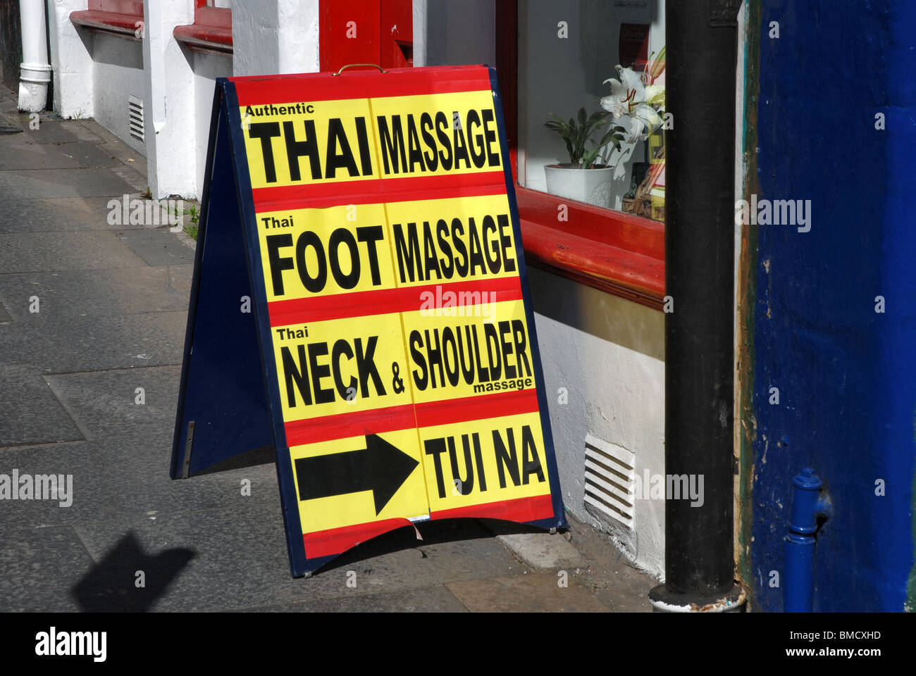 Sign in Edinburgh's Old Town advertising massages. Stock Photo