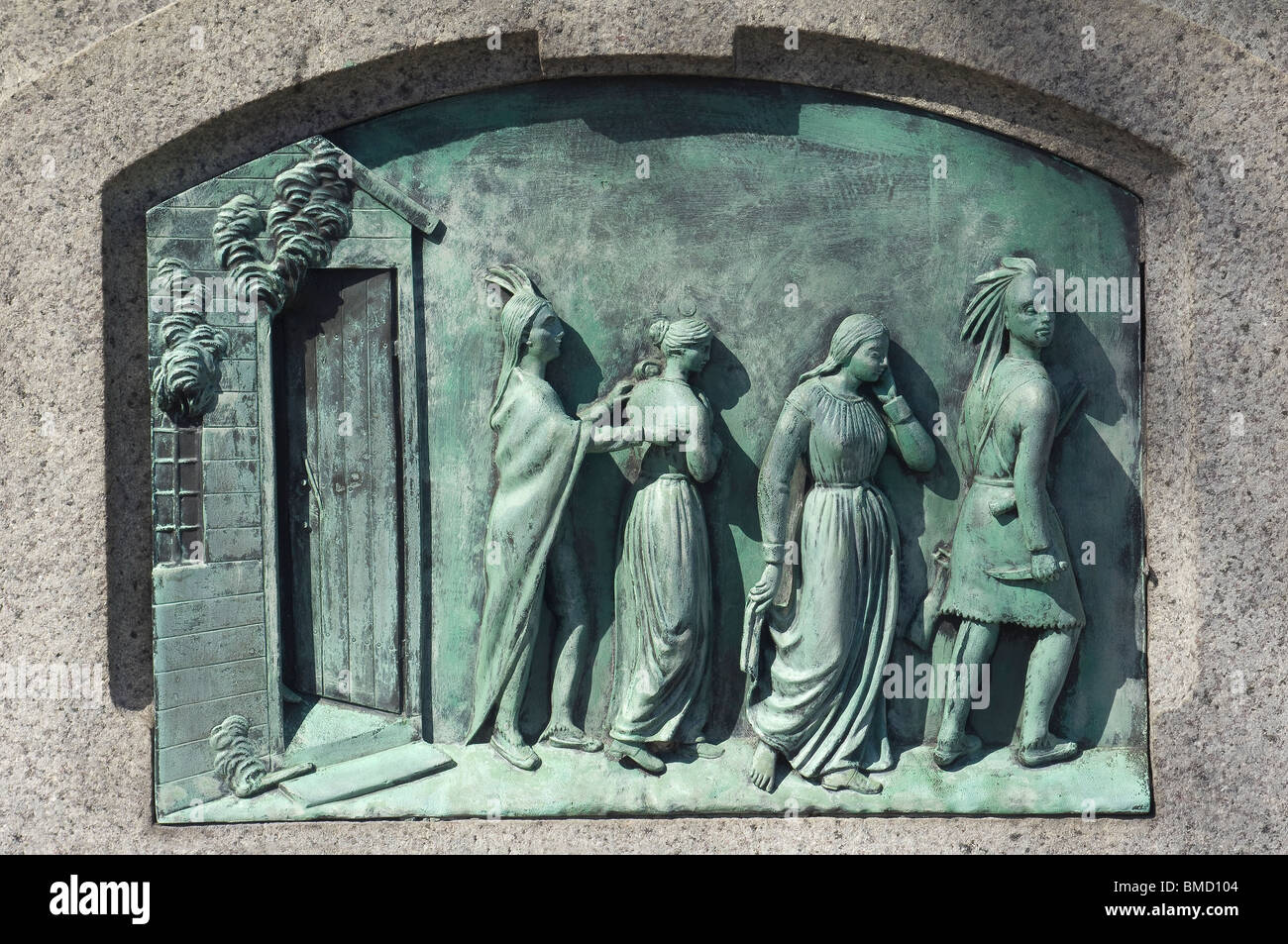 Hannah Duston kidnapped by Indians, bas-relief on a memorial in Haverhill,  Massachusetts. Digital photograph Stock Photo
