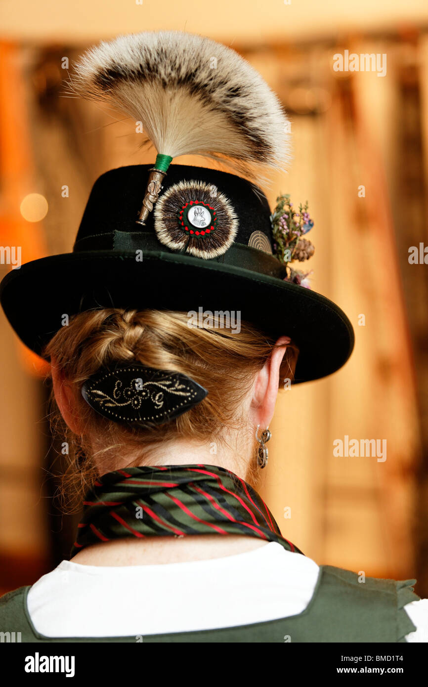 Woman Wearing a Gamsbart, Traditional Bavarian Dress Hat, Upper Bavaria Germany. Stock Photo