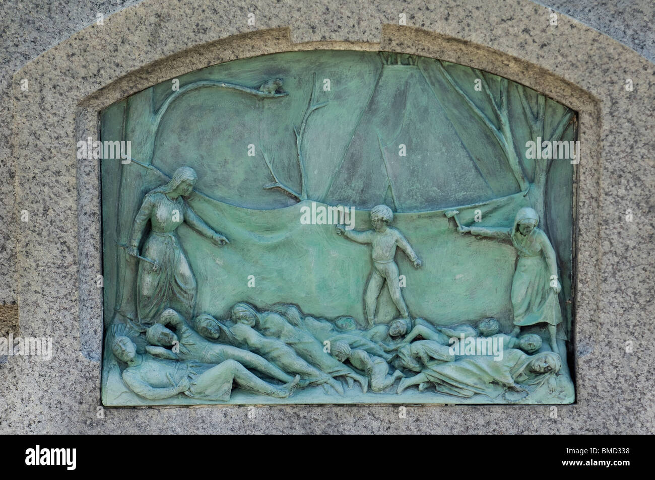 Hannah Duston killing Indians who kidnapped them, bas-relief on a memorial in Haverhill, Massachusetts. Digital photograph Stock Photo