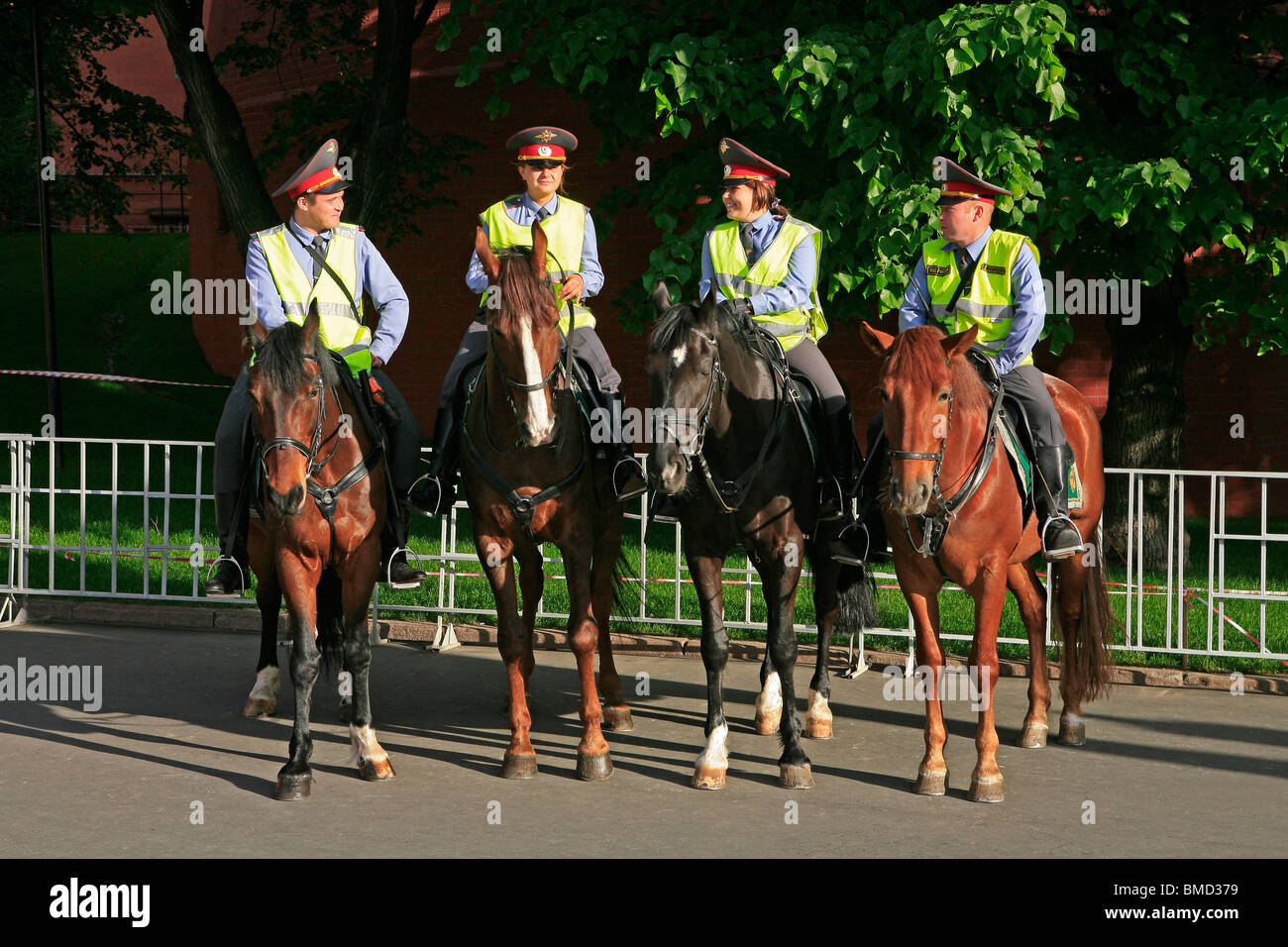 Four mounted Russian police officers outside the Kremlin in Moscow, Russia Stock Photo