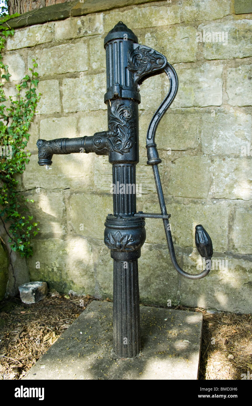 Old water pump outside All Saints Church at Laughton En Le Morthen Stock Photo