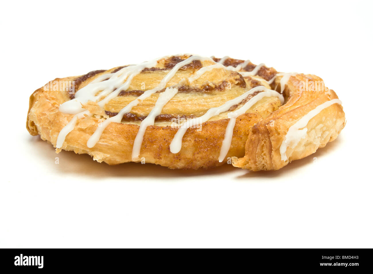 Cinnamon Danish Pastry swirl isolated against white background Stock Photo