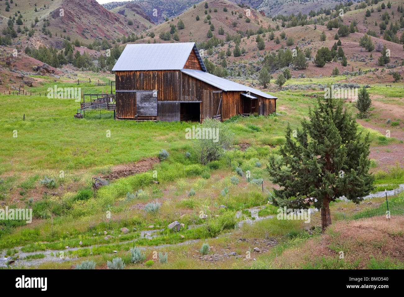 An old wooden barn on a large cattle ranch along the John Day River in central/eastern Oregon Stock Photo