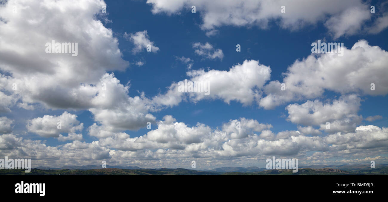 Cumulus clouds over the Cumbrian hills from Arnside Knott, Cumbria. Stock Photo