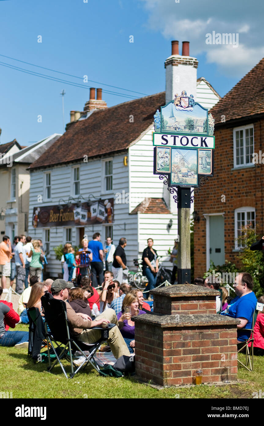 Crowds of people outside the Hoop Public House in the village of Stock in Essex.  Photo by Gordon Scammell Stock Photo