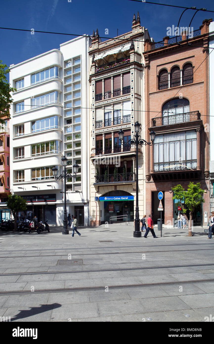 Ybarra Building (left, white facade), one of the few samples of Rationalist architecture in Seville, Spain Stock Photo