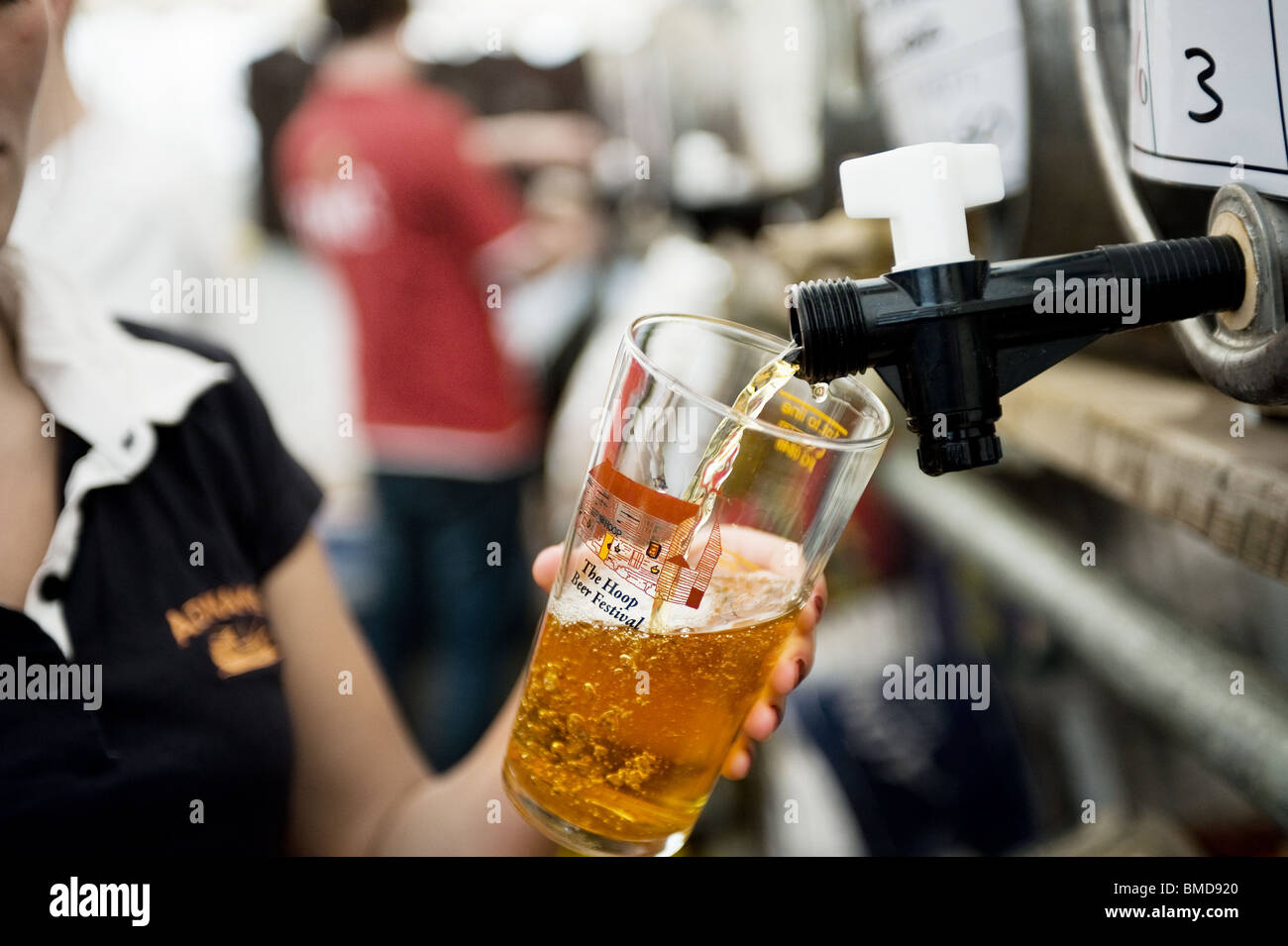 A pint of real ale being poured at the Hoop Pub Beer Festival in Stock in Essex. Stock Photo