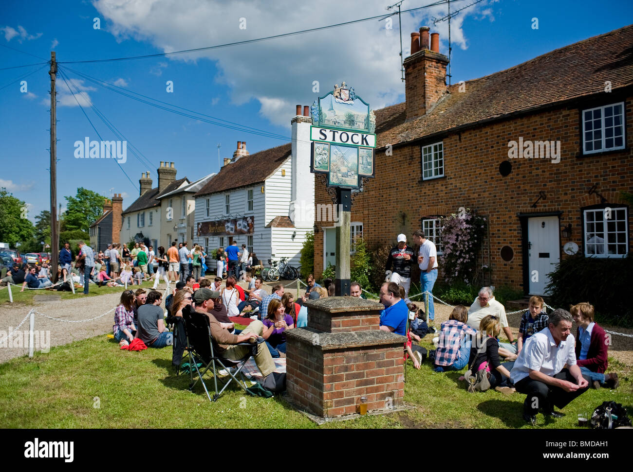Crowds of people outside the Hoop Public House in the village of Stock in Essex.  Photo by Gordon Scammell Stock Photo