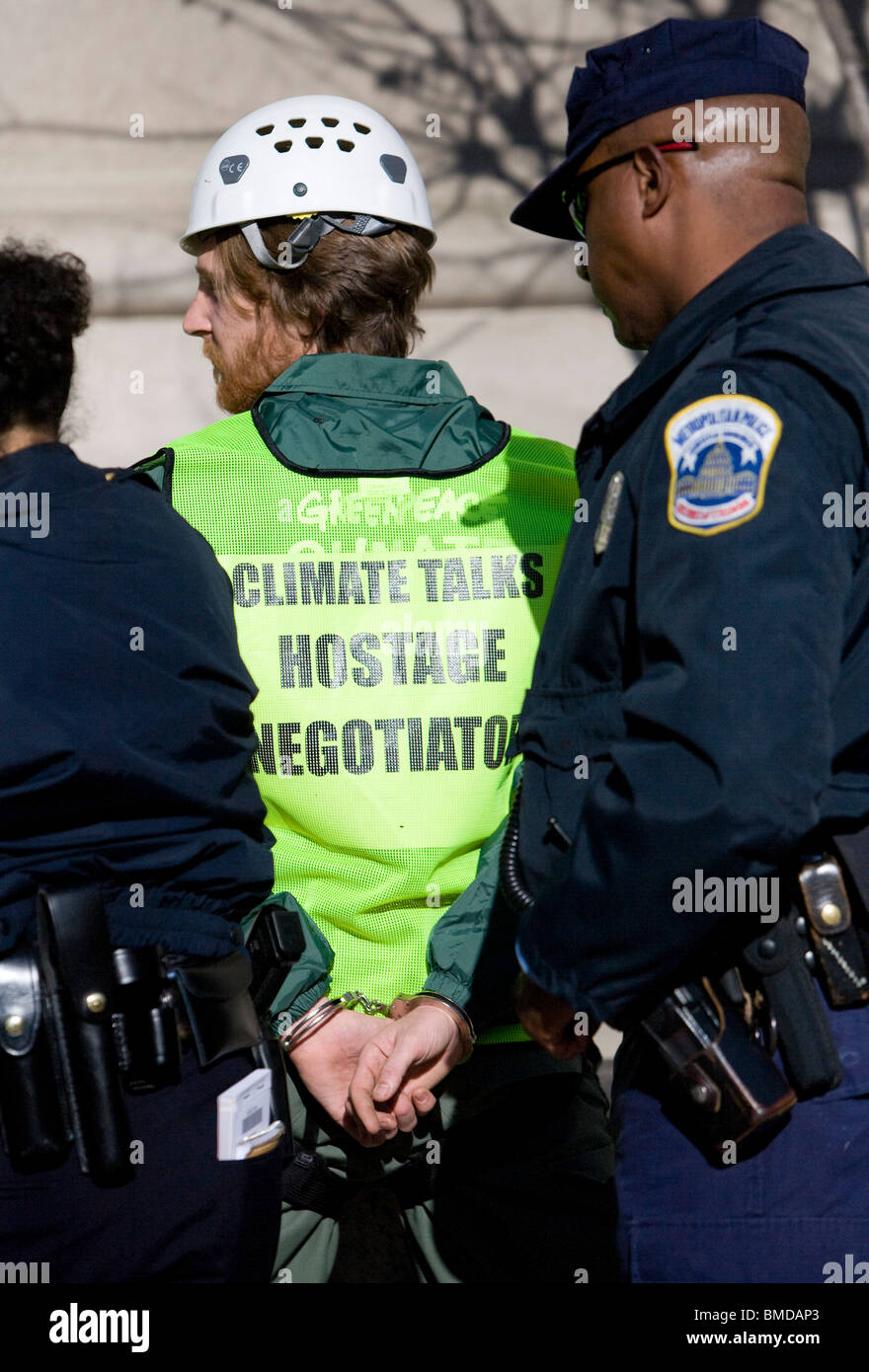 Greenpeace protesters being arrested. Stock Photo