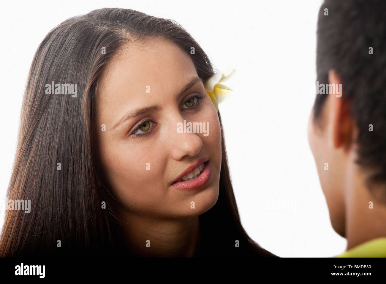 beautiful young woman talking to a man Stock Photo - Alamy