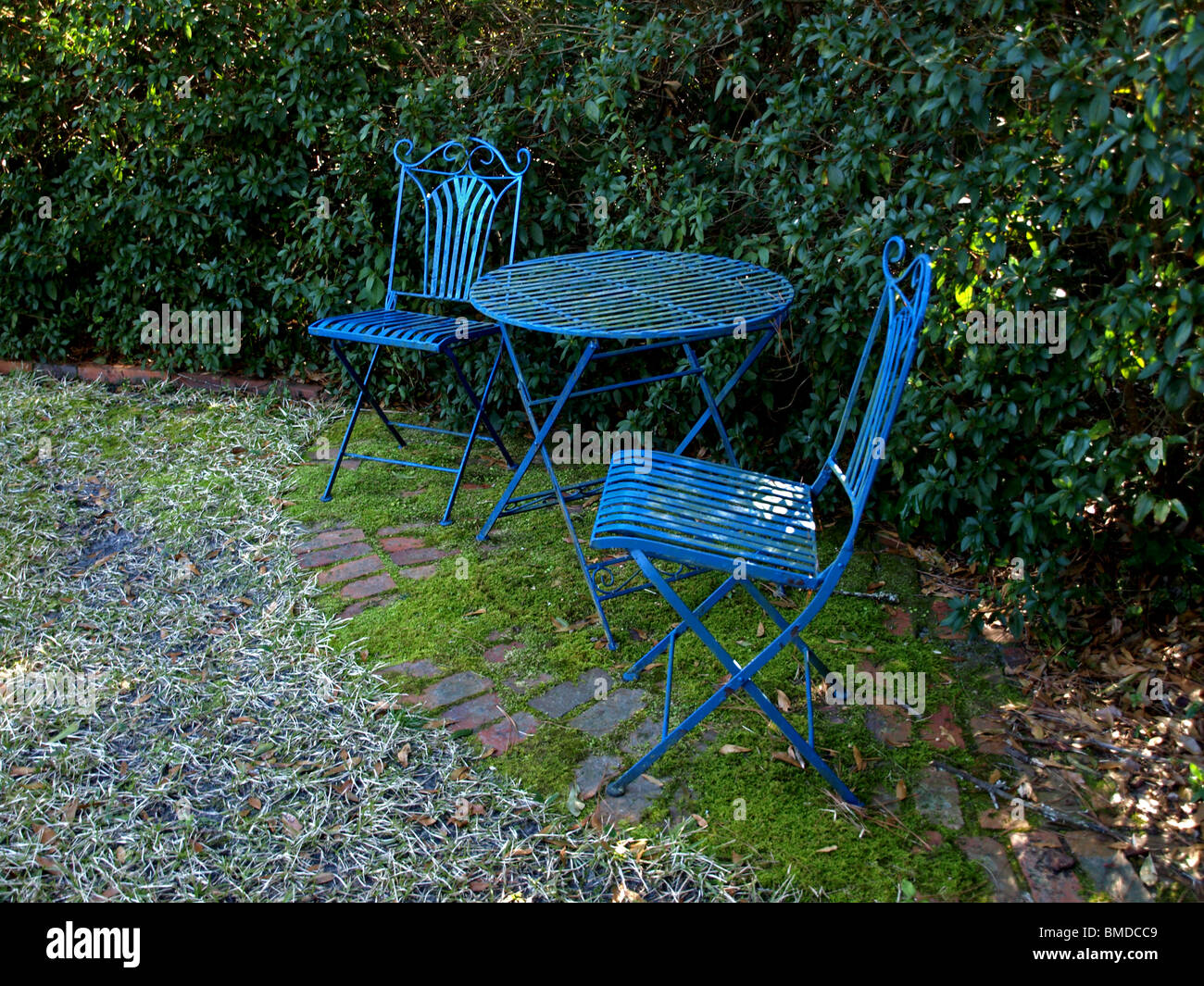 blue metal table and chairs for outdoor patio living Stock Photo Alamy