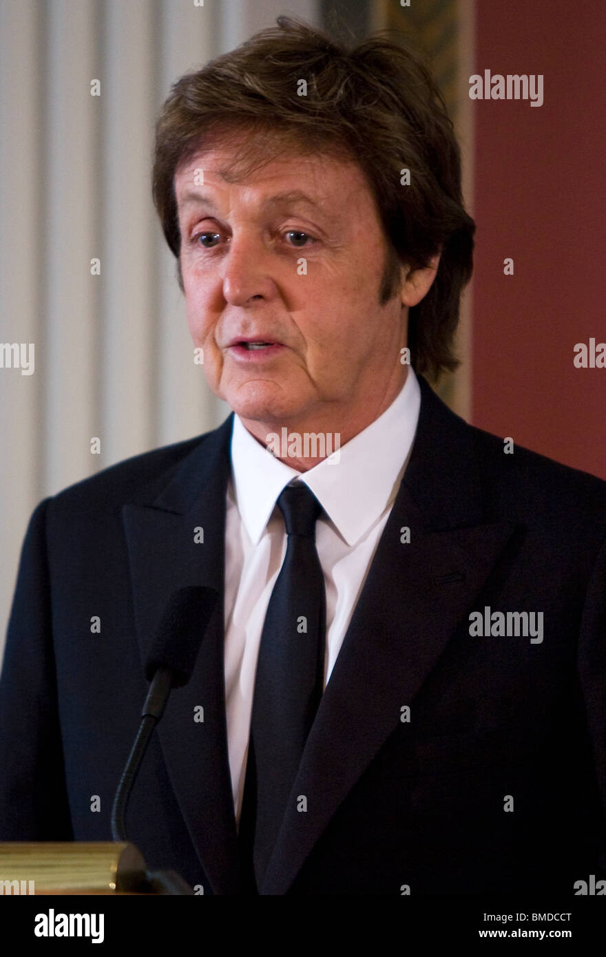 Paul McCartney takes questions at a press conference. Stock Photo