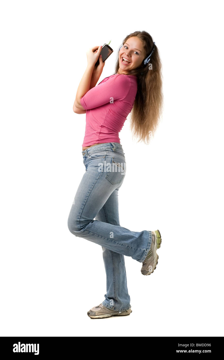 Beautiful happy girl in pink jacket and jeans dance with PDA, isolated