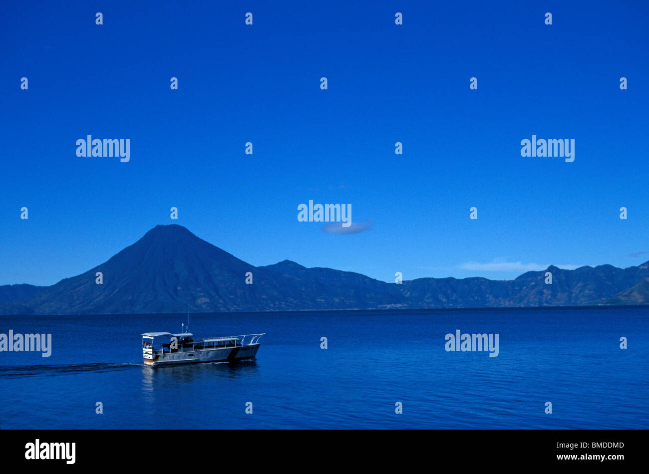 Ferry boat crossing Lake Atitlan, Guatemala Stock Photo