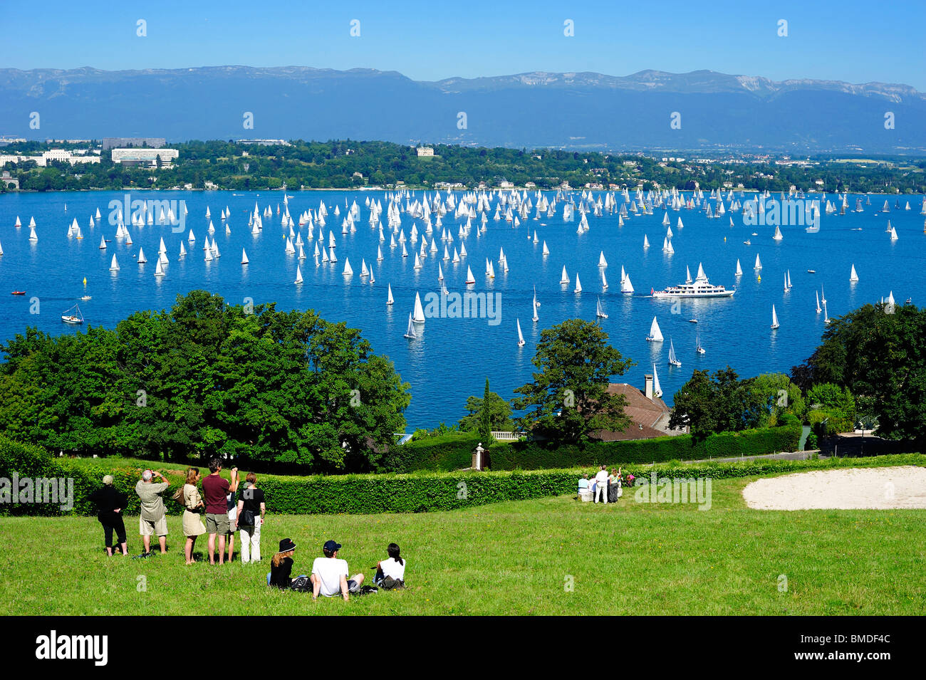 Spectators watching the start of the annual Bol d’Or (Gold Cup) sailing race on Lac Léman (Lake Geneva). Stock Photo
