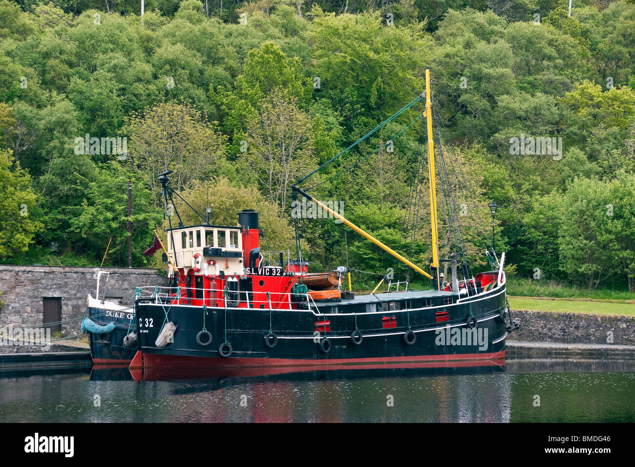 Restored puffer S.L. Vic 32 moored in the Crinan Canal basin in Crinan  Argyll and Bute Scotland Stock Photo - Alamy
