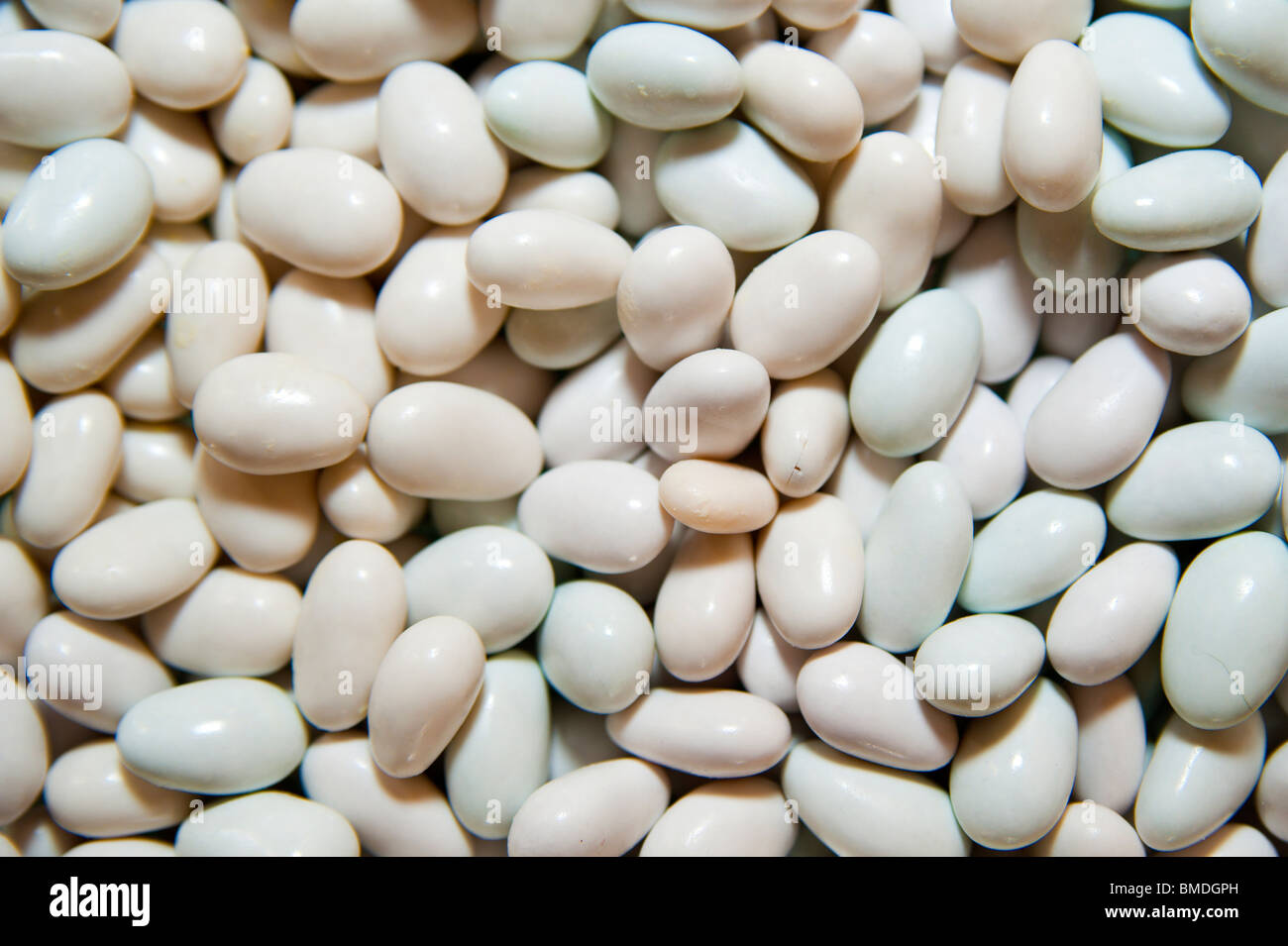White sugar coated almonds close up Stock Photo Alamy