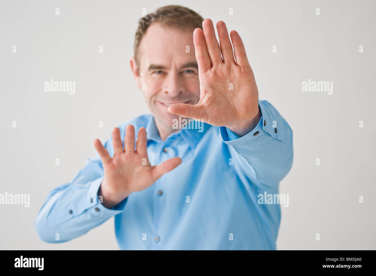 Man With Outstretched Hands Stock Photo Alamy
