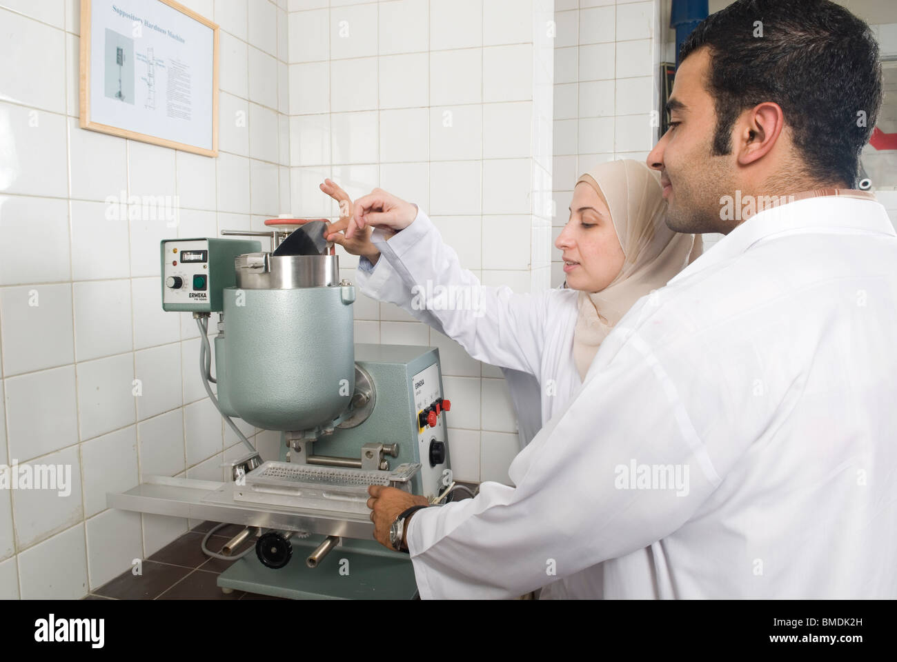 Muslim scientists man and woman working inside lab Beirut Lebanon Middle East Stock Photo