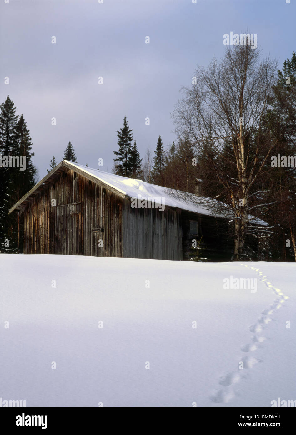 An old farmhouse in snowy landscape Stock Photo - Alamy