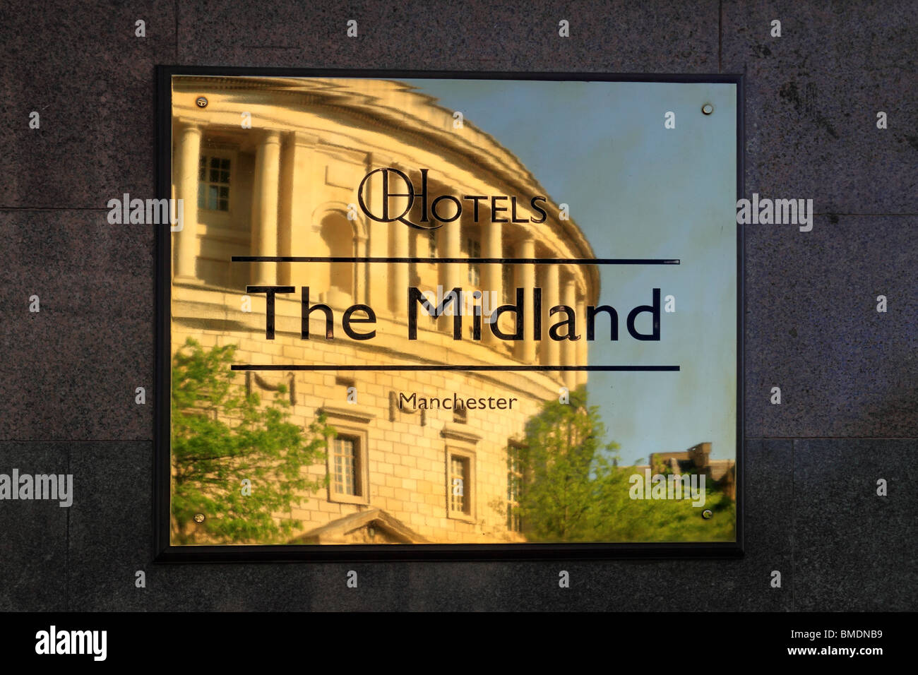 The Central Library reflected in the sign at the Midland Hotel, Manchester Stock Photo