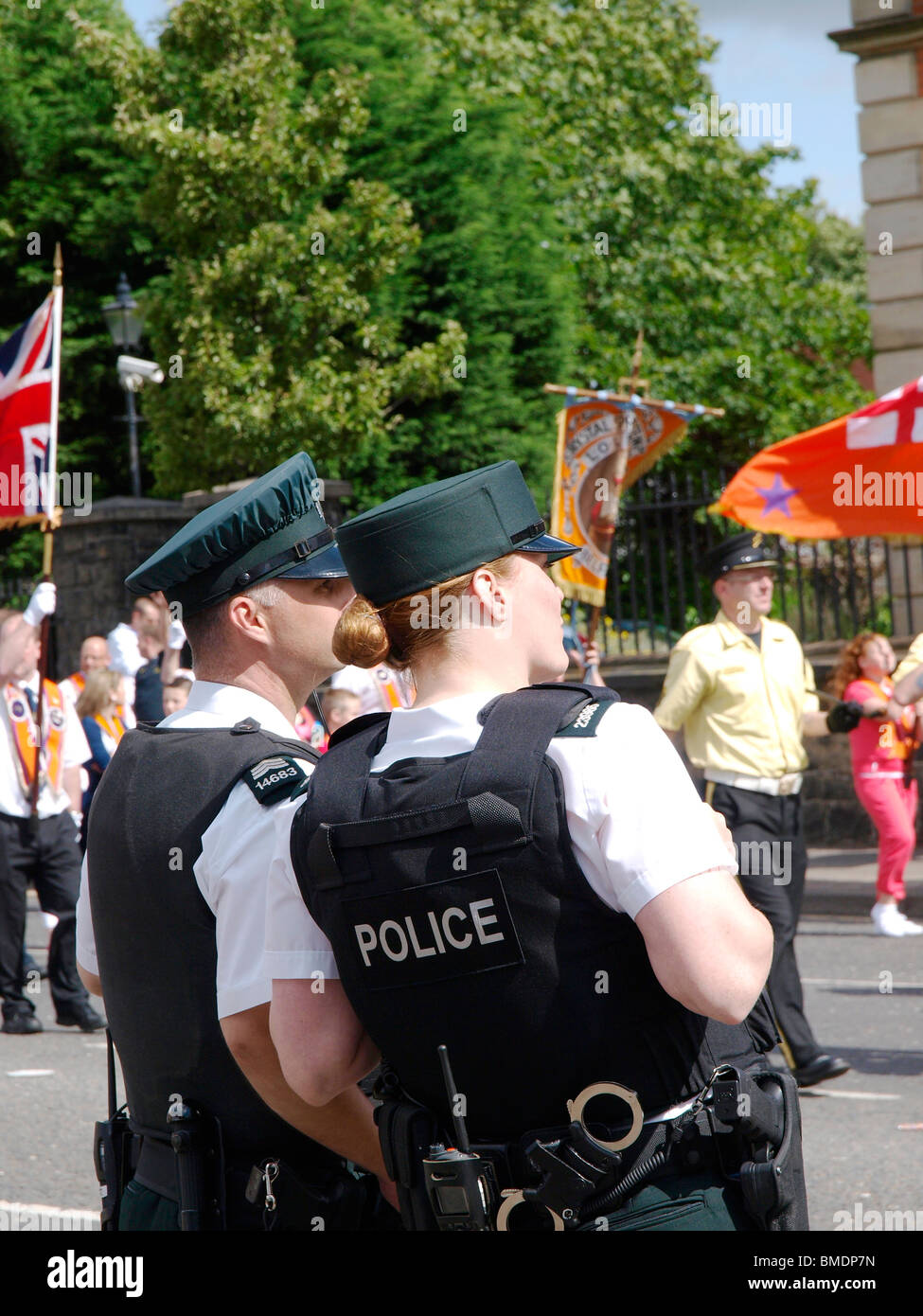 Orangefest, 12th July 2009 Orange parade through the center of Belfast. Police cordon off a catholic area near Clifton Street. Stock Photo