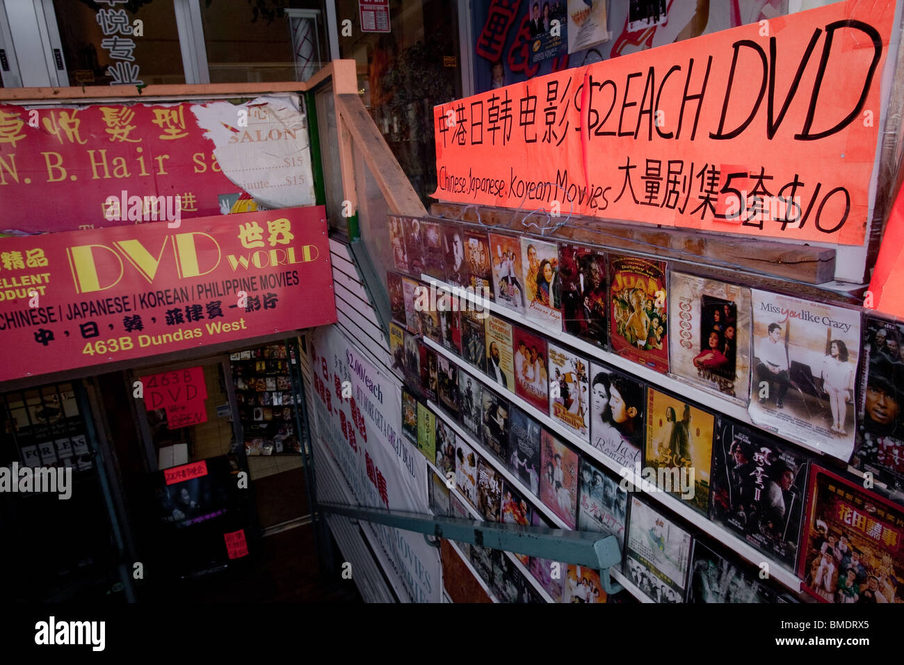 Chinese, Japanese and Korean movies are on display for sale outside a store in Toronto Chinatown Stock Photo
