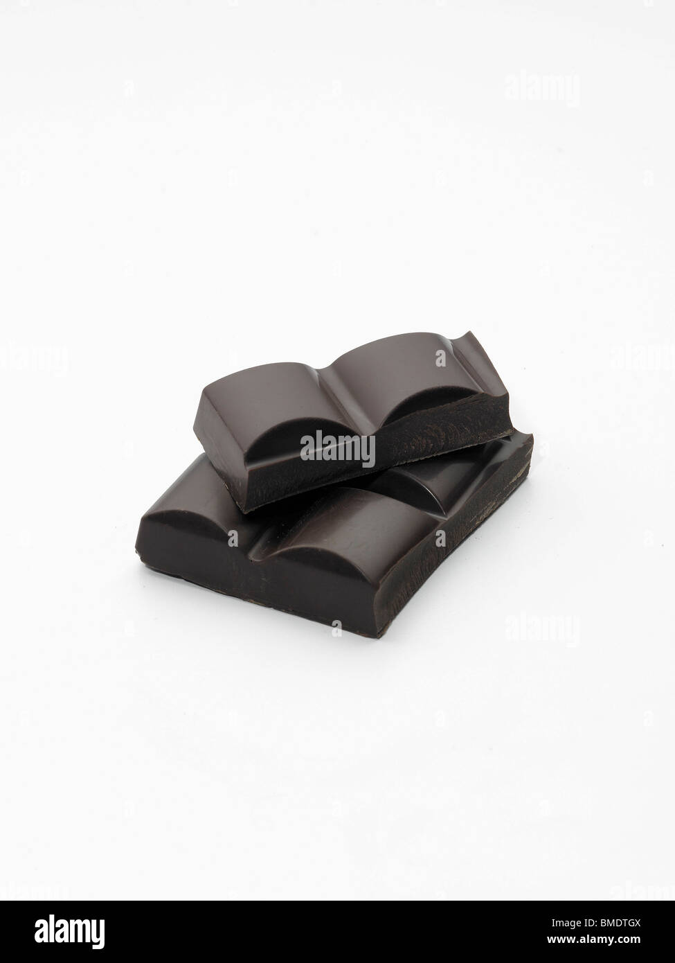 Plain Chocolate Chunks on White Back Ground Stock Photo