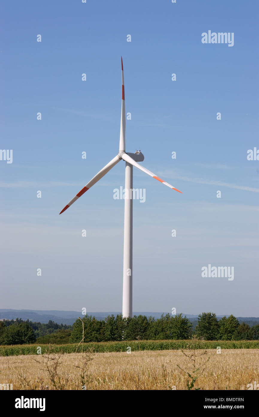 Renewable energy generating wind turbine in the German countryside