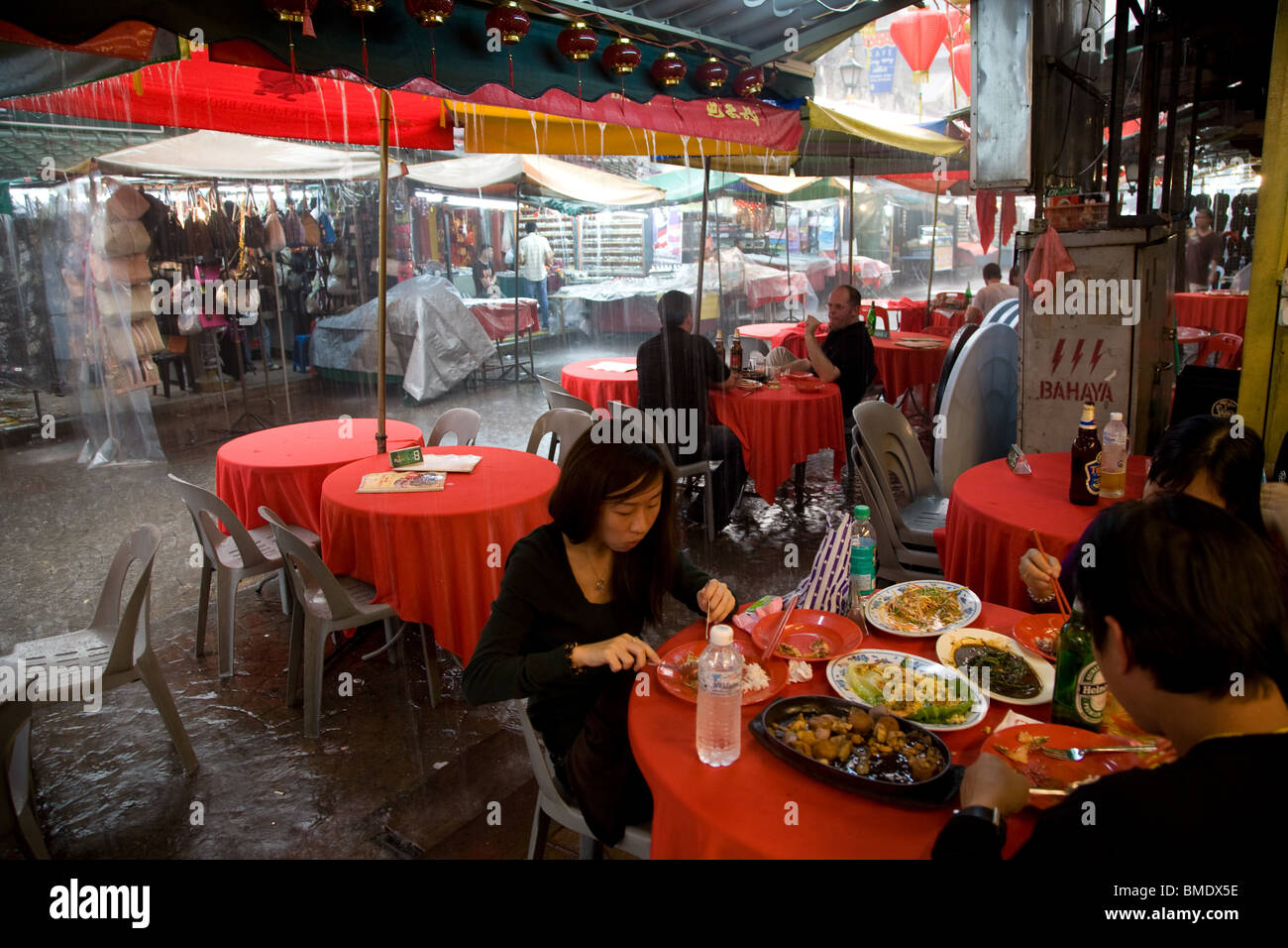 Petaling street market stall thunderstorm heavy rain Stock Photo