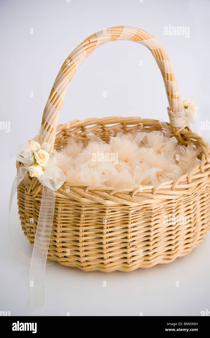 Rice wedding pouches in a basket Stock Photo