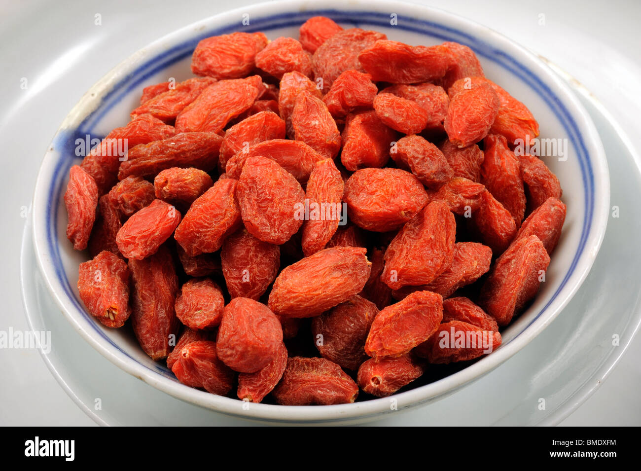 Dried Goji Berries in dish Stock Photo