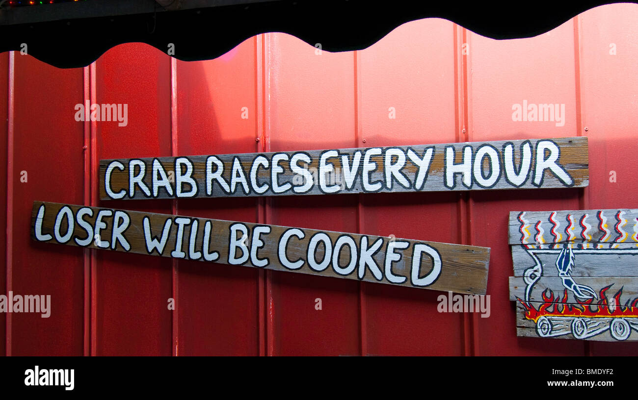 Humorous restaurant sign in historic Tin City, a waterfront marketplace