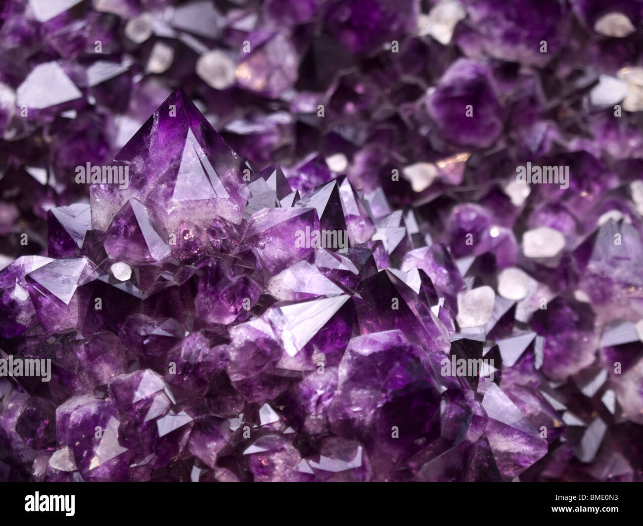 Close up on an amethyst geode. Shallow depth of field. Stock Photo