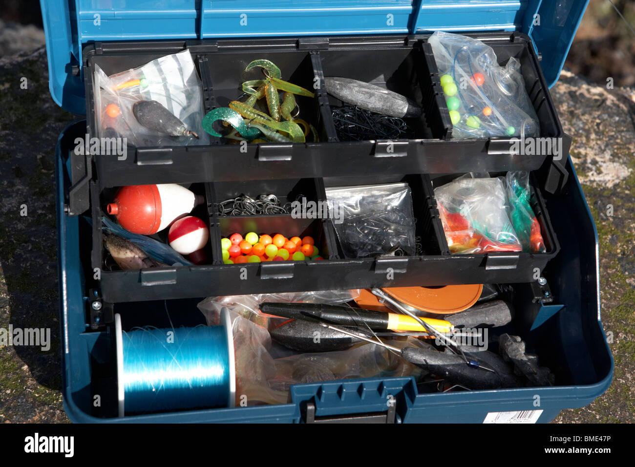fishing tackle box filled with sea fishing gear northern ireland uk Stock  Photo - Alamy