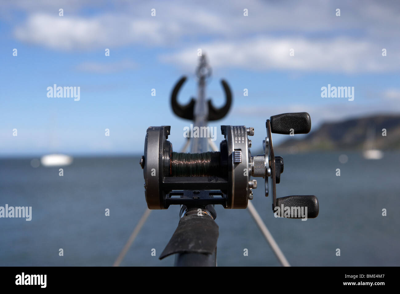 rod and reel fishing on the county antrim coast northern ireland uk Stock Photo