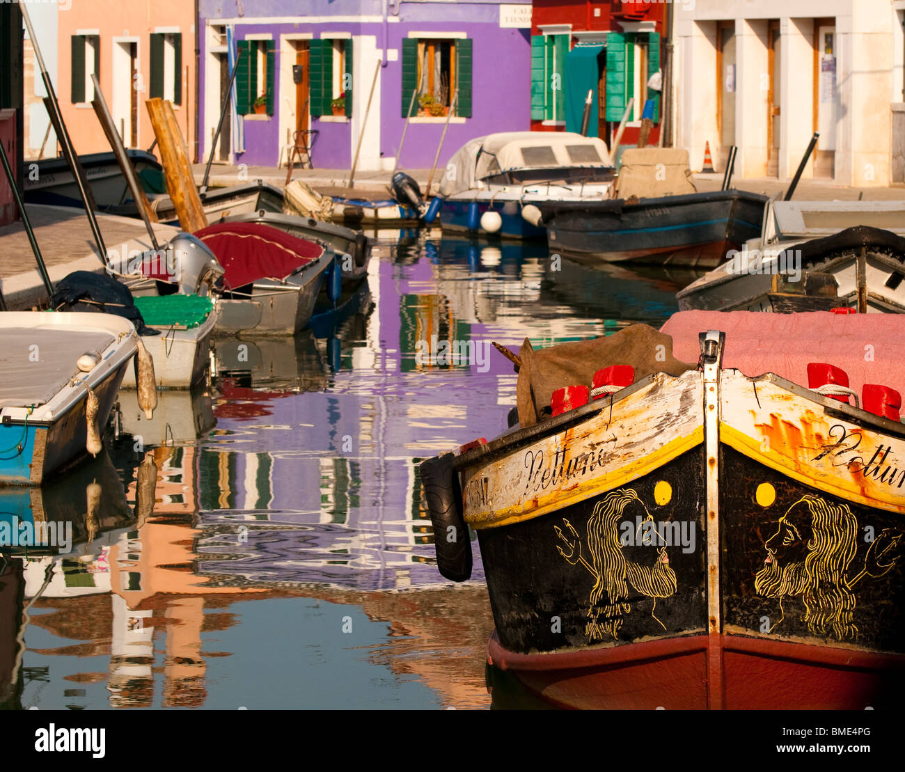 Colorful houses reflecting in canal hi-res stock photography and images