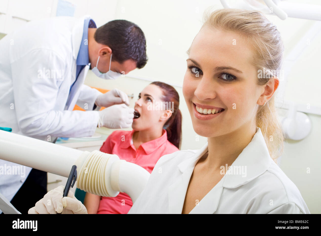 dental assistant in dentist office Stock Photo Alamy