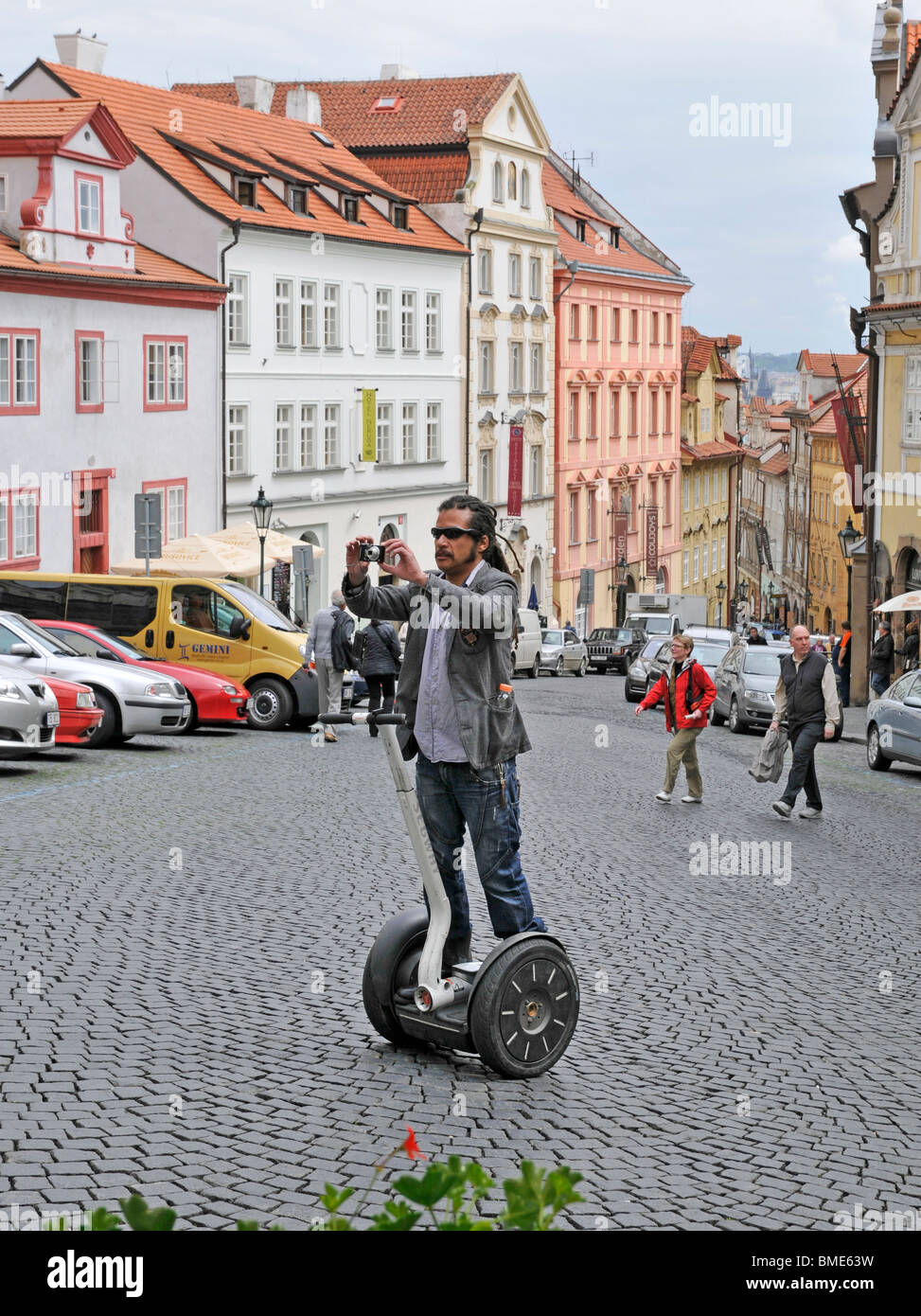 Tourist driving by segway and shooting snapshot,Praga Prague Czech Republic East Europa Stock Photo