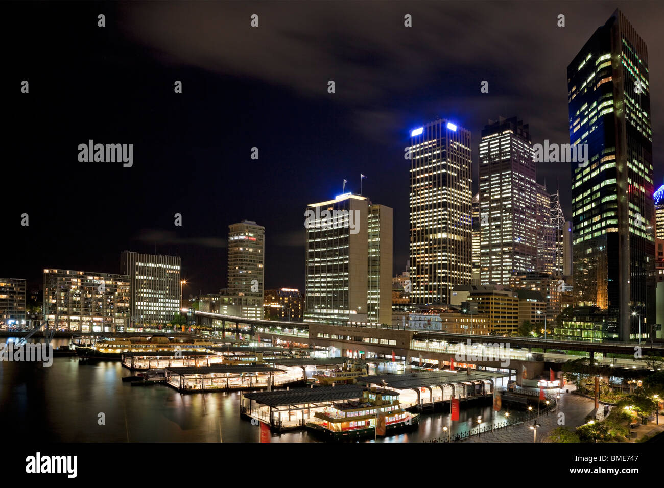 Sydney CBD at night from Circular Keys with ferries and terminal in foreground Stock Photo Alamy