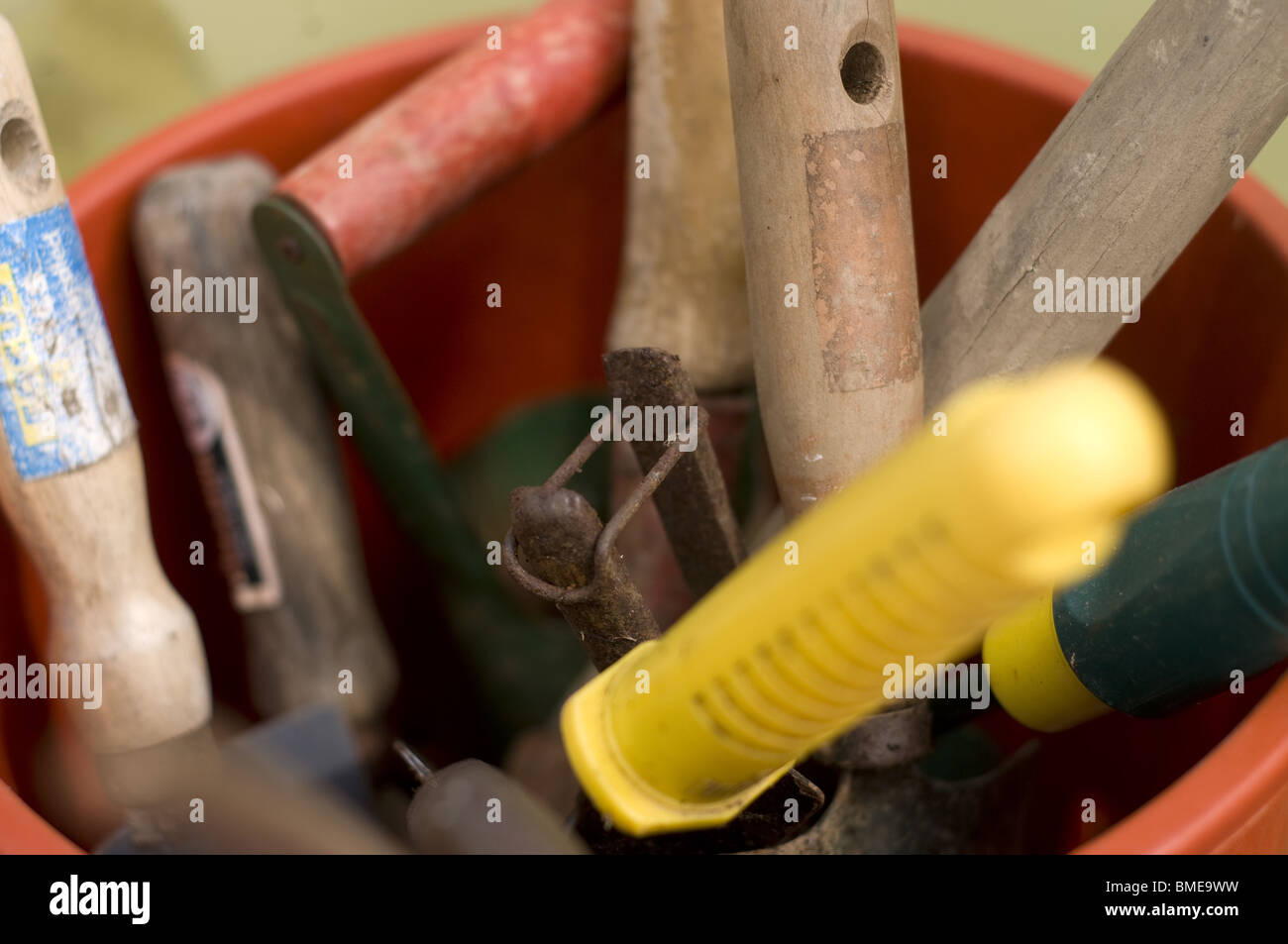 Collection of garden tools in a red bucket Stock Photo Alamy