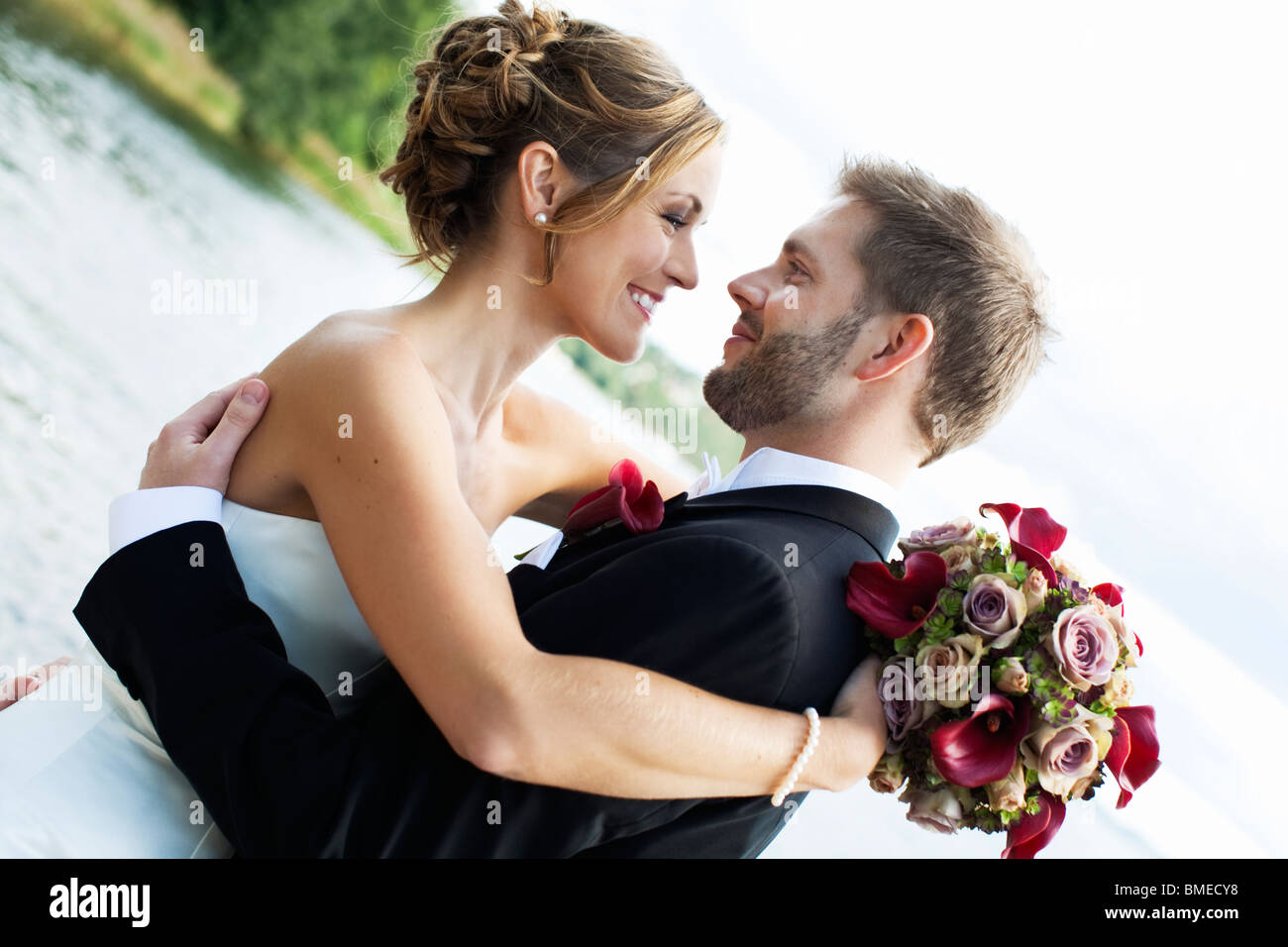 bride and groom embracing Stock Photo