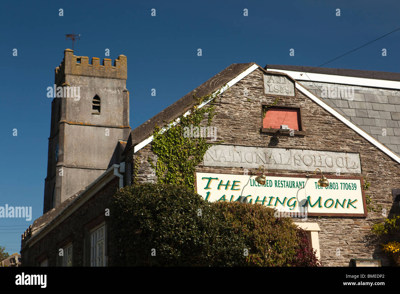 UK, England, Devon, Strete, Laughing Monk restaurant in former National School building Stock Photo